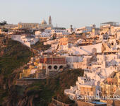 View of Fira Santorini, while the sun is going down.